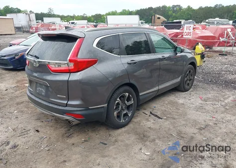 2017 Honda Cr-V Touring z USA, uszkodzony, nr VIN 2HKRW1H98HH514000